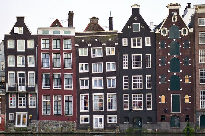 Amsterdam Day Trip from Brussels With Cheese, Clogs and Windmills - Optional canal cruise: your best way to stretch limited hours