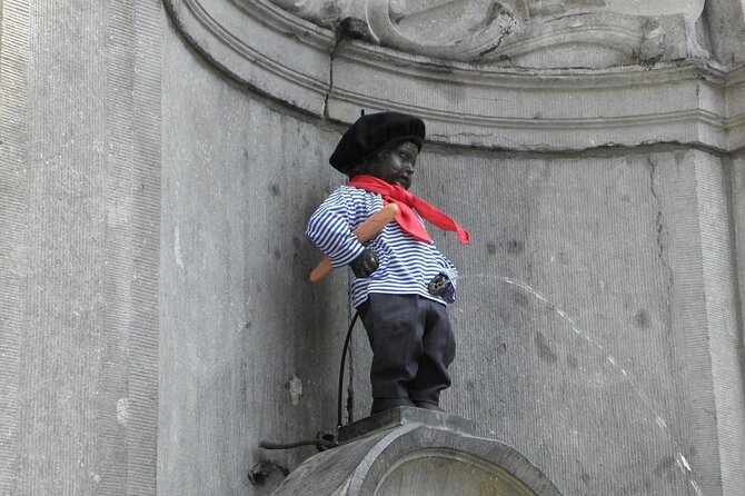 Brussels 2-Hours Walking Tour: Must-See Highlights in the Center - Manneken Pis: The Icon and Its Legendary Backstory