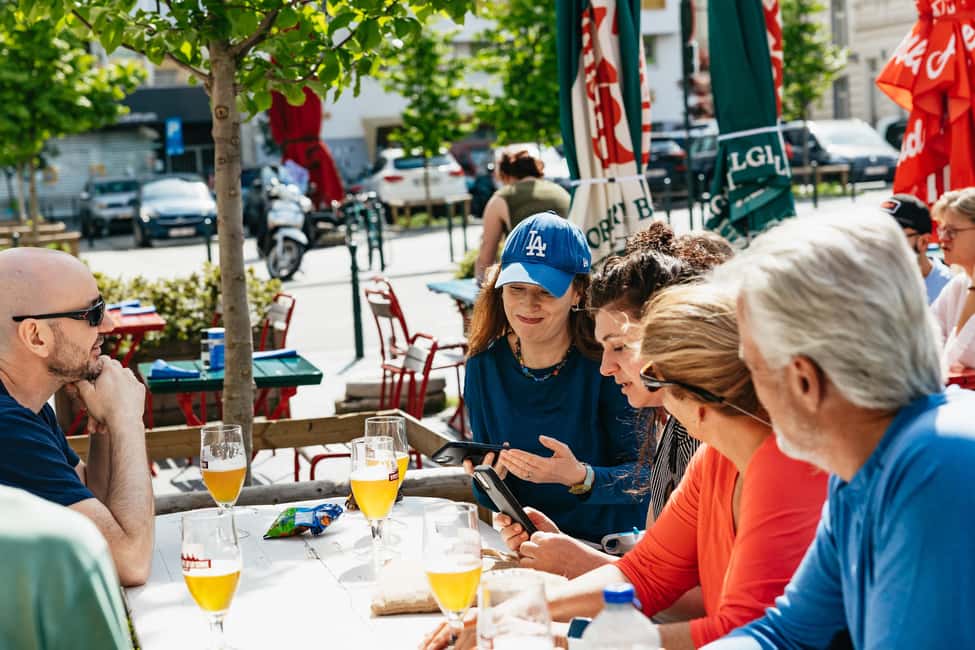Brussels: City Highlights and Hidden Gems Bike Tour - Following a Guide Who Reads the Room (and the Weather)