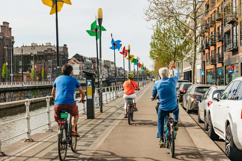 Brussels: City Highlights and Hidden Gems Bike Tour - Rain or Shine Cycling: Practical Tips for Comfort
