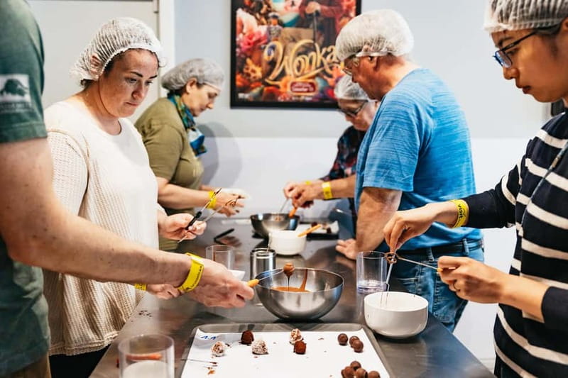 Brussels: Make Your Own Chocolates Workshop with Tastings - Meeting the chocolatier: Champagne, an apron, and getting set up