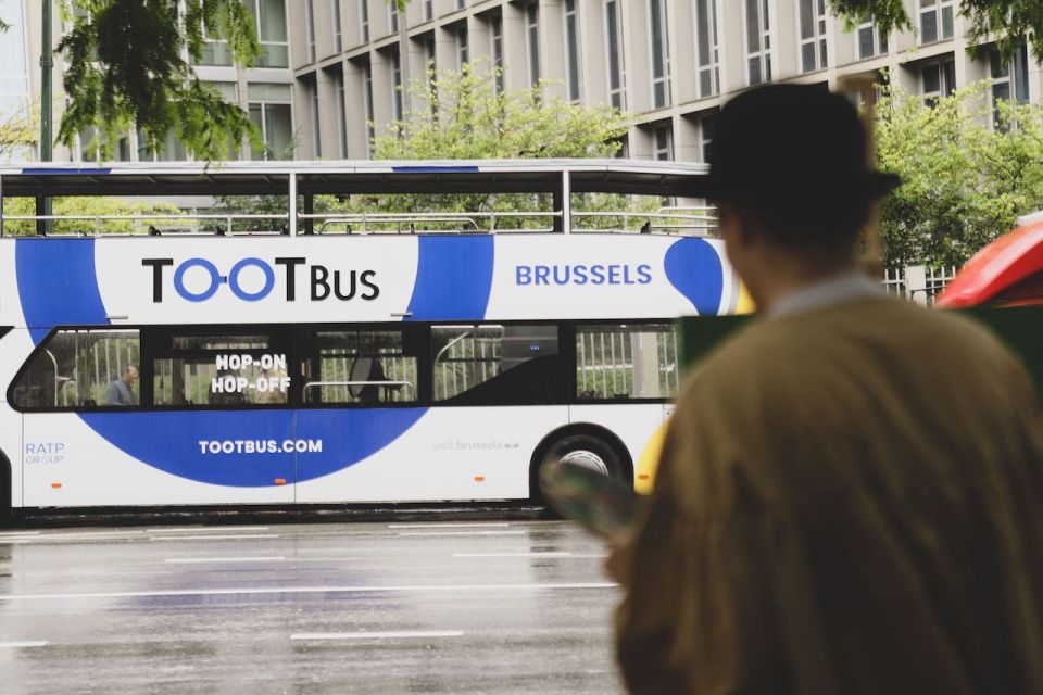Brussels: Sightseeing Sunset Bus Tour - The audio guide experience: when it shines and when you’ll wish it were tighter