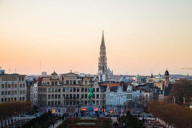 Brussels Walking Tour with Waffle Tasting: History and Delights - Town Hall Gothic power and the Michael-on-the-tower moment