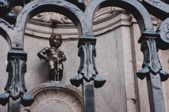 Brussels Walking Tour with Waffle Tasting: History and Delights - Sablon district: boutiques, local style, and a calmer tempo