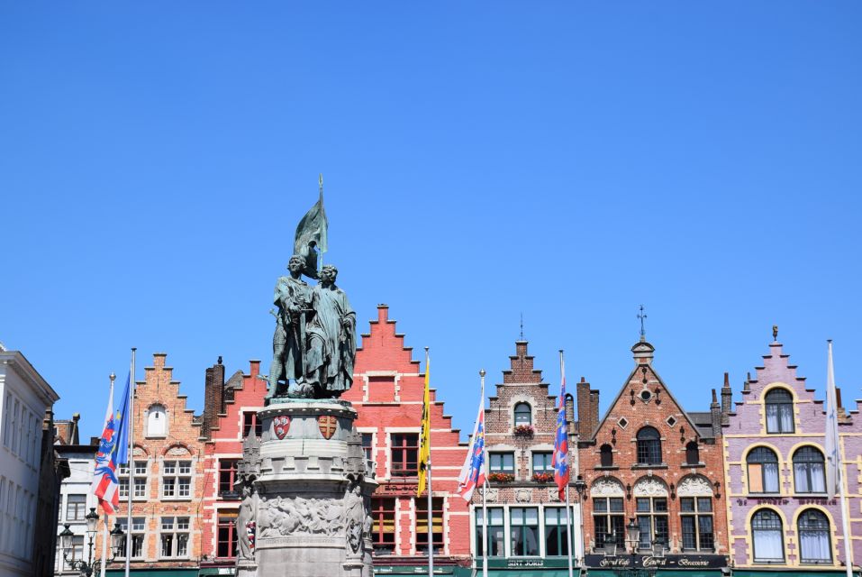 From Brussels: Bruges Private Tour - Entering the Medieval Core: Wall Park, Market Square, and the Quick Orientation
